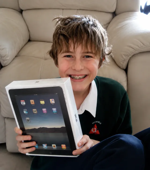 Joel working on an iPad